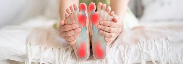 Chiropractic Waukee IA Foot Pain Person with foot pain.